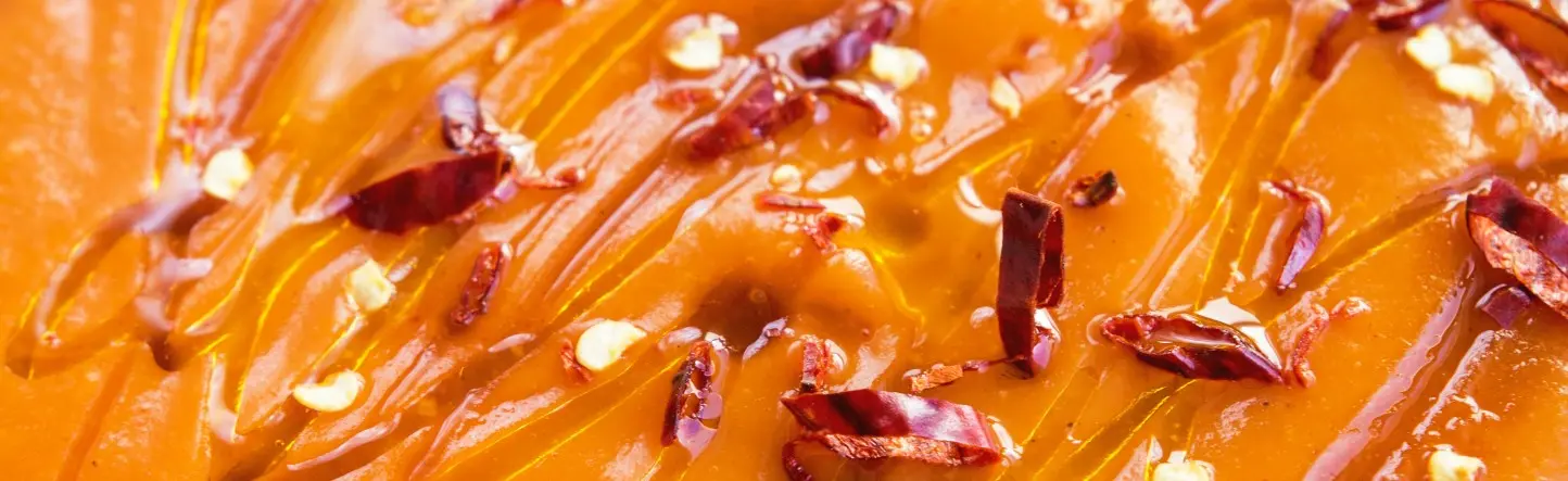 Krem z pieczonej dyni i pomidorów z syropem klonowym